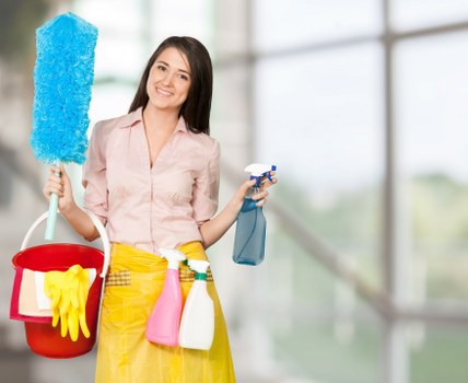 Professional carpet cleaner working in a Ruislip home